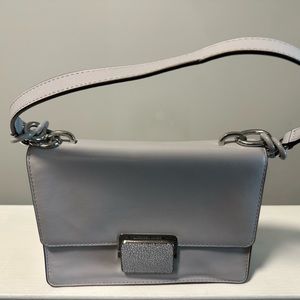 Small leather MK bag with a crossbody strap
